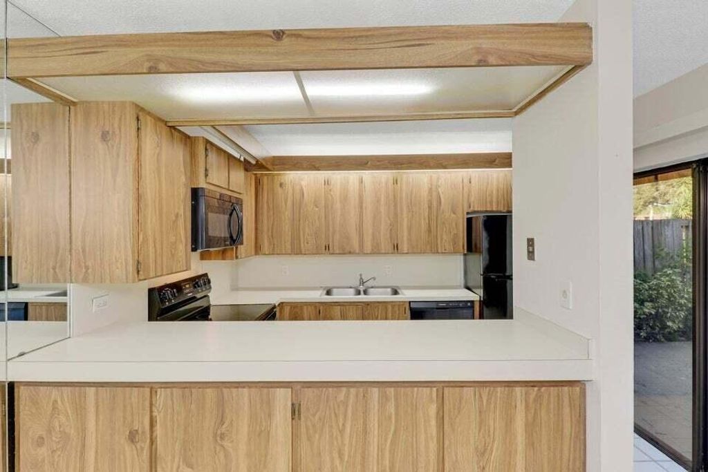 Photo of 1304 13th Lane, Palm Beach Gardens, FL 33418 (MLS # R11074354)