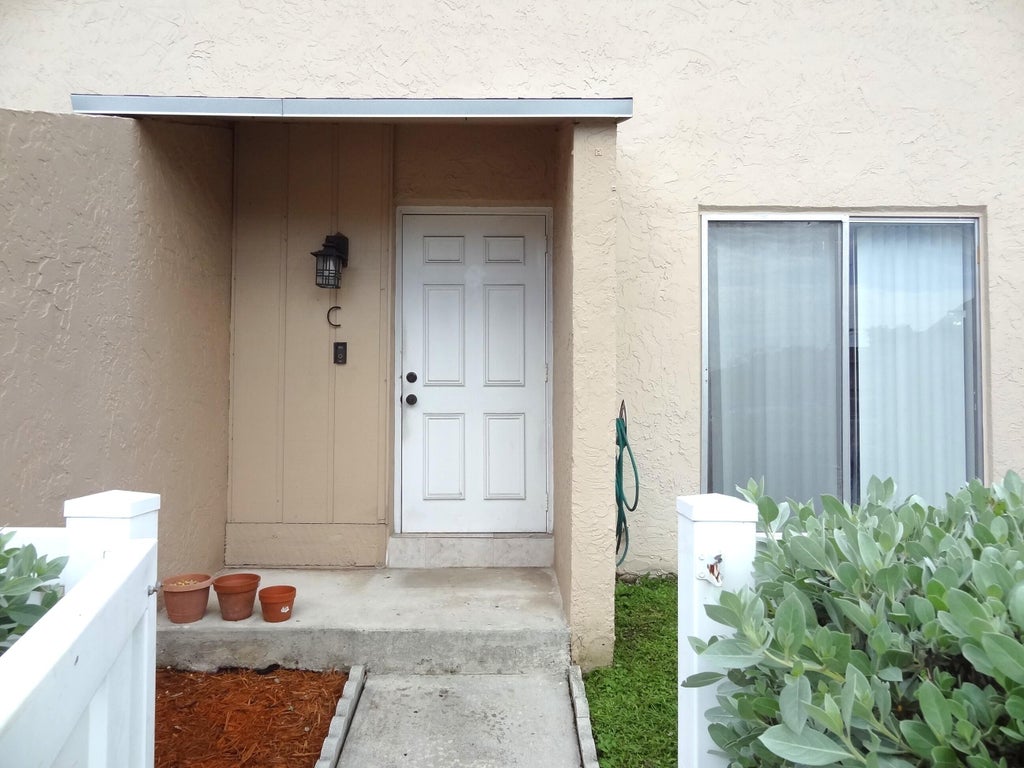 Photo of 1705 NW 80th Avenue #C, Margate, FL 33063 (MLS # B26062008)