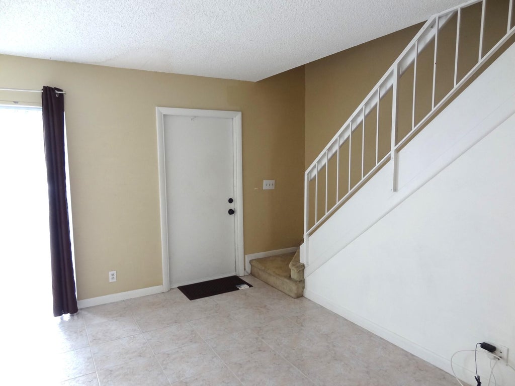 Photo of 1705 NW 80th Avenue #C, Margate, FL 33063 (MLS # B26062008)
