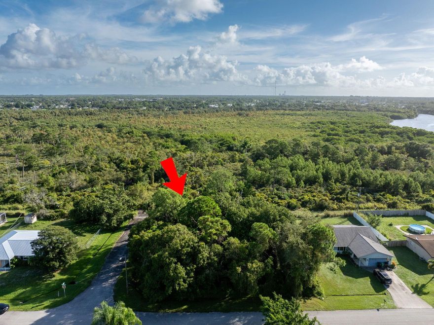 Don't miss your opportunity to build your dream home on this one-of-kind lot in central Port St Lucie. If you have been looking for tranquility but still want to be close to modern conveniences, this is it! This .35 acre corner lot is located in a quiet neighborhood with only two points of entry which means limited traffic and a greater sense of privacy. Enjoy the view of the unspoiled Florida preserve right in your own backyard. This preserve is home to many of Florida's indigenous flora and fauna, ideal for any nature enthusiast. It also backs up to the St Lucie River, with the River Park Marina just 1.5 miles away. You are also close to shopping and restaurants, and less than 6 miles from the highway - great for commuters! Builder recommendations available on request.