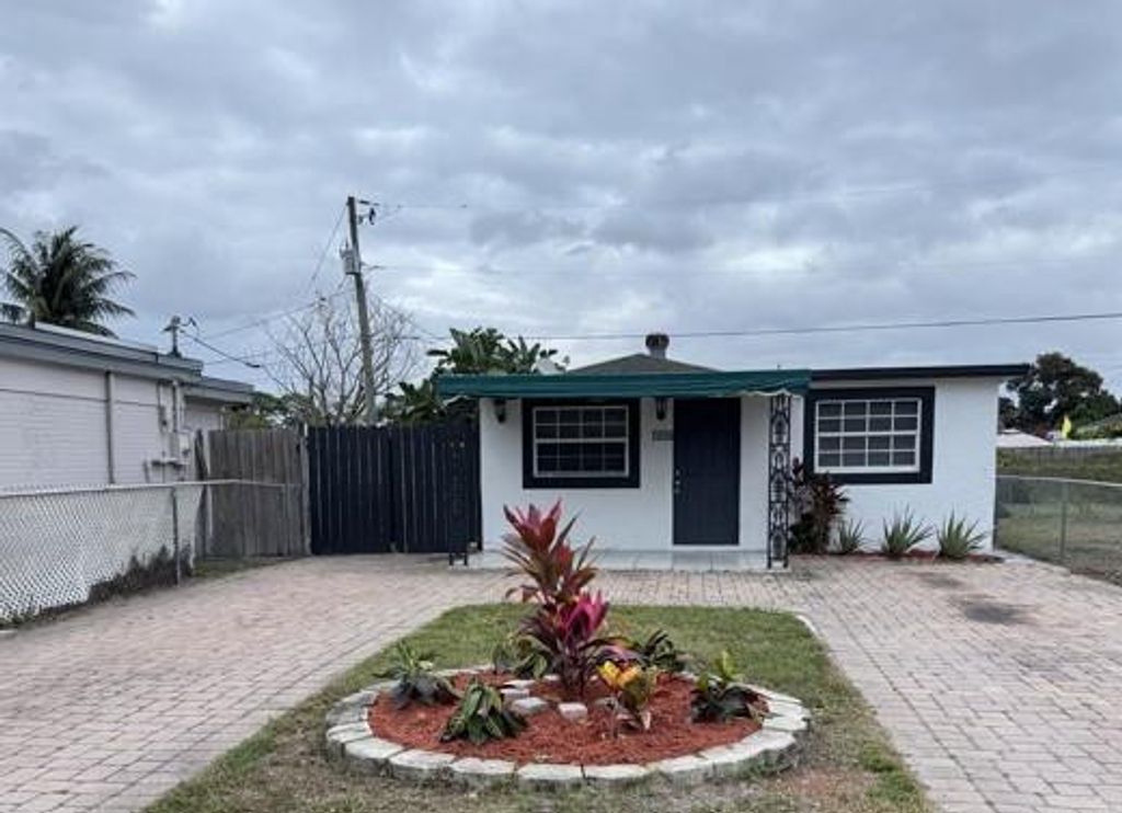 Photo of 350 Walker Avenue, Greenacres, FL 33463 (MLS # F10545387)