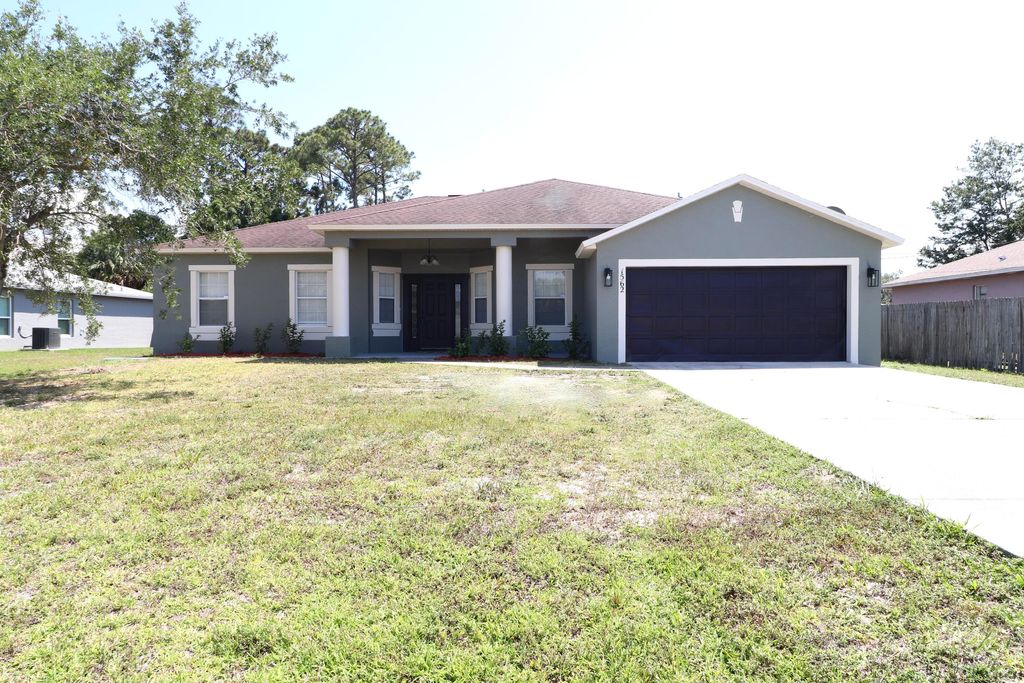 Photo of 1562 SW California Boulevard Blvd, Port St Lucie, FL 34953 (MLS # R10800053)