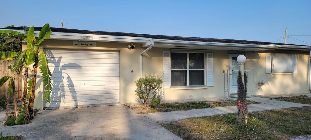 Photo of 221 Beach Avenue, Port St Lucie, FL 34952 (MLS # R10868150)