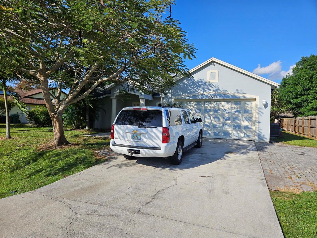 Photo of 555 SW Aster Road, Port Saint Lucie, FL 34953 (MLS # R10973257)
