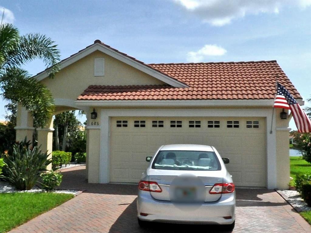 Photo of 686 SW Treasure Cove, Port Saint Lucie, FL 34986 (MLS # R10737409)