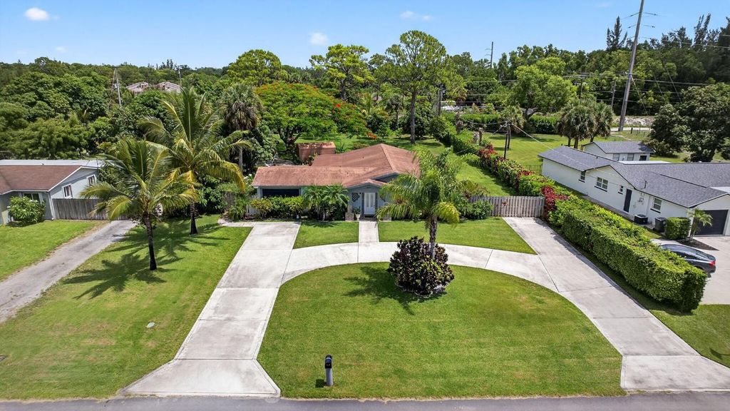 Photo of 6591 Patricia Drive, West Palm Beach, FL 33413 (MLS # R11106894)