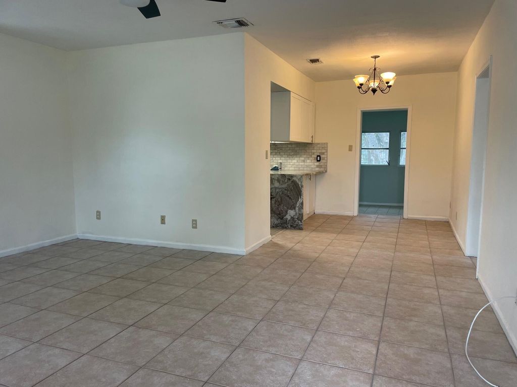 Photo of 339 Foresteria Drive, Lake Park, FL 33403 (MLS # R11021075)