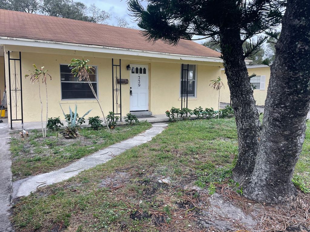 Photo of 339 Foresteria Drive, Lake Park, FL 33403 (MLS # R11021075)