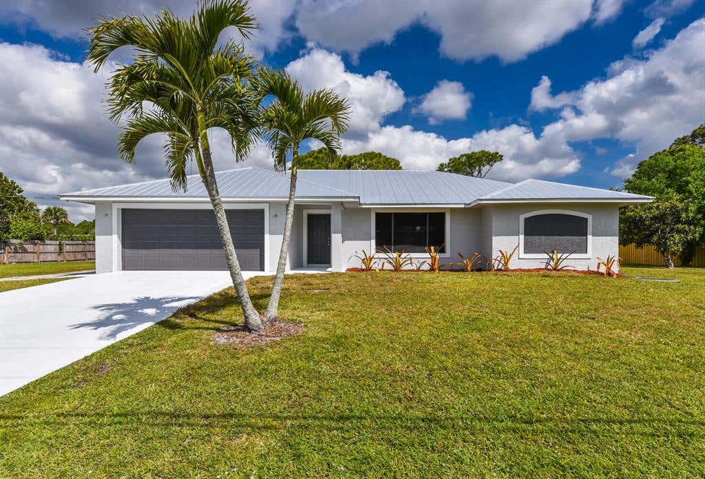 Photo of 373 SW Fairway Avenue, Port Saint Lucie, FL 34983 (MLS # R10702097)