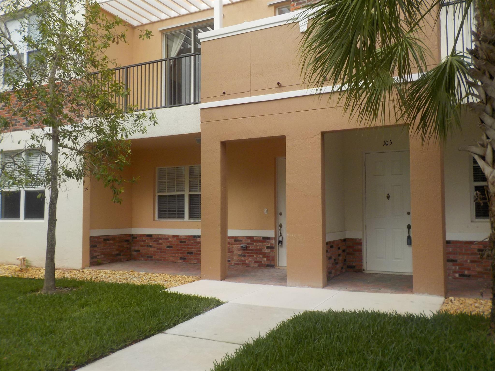 Step into this first-floor condo with an attached garage, nestled in the heart of Tradition. Boasting a spacious split-bedroom layout, this unit features a master suite complete with dual sinks, a Roman tub, and a separate shower. The kitchen is equipped with modern appliances and ample storage, seamlessly flowing into the living and dining areas. Enjoy your morning coffee on the private covered balcony. Residents of the gated Promenade community have access to amenities including a pool, sidewalks, and street lighting. Located just minutes from I-95 and within walking distance to Tradition Square, this condo offers unparalleled convenience to shopping, dining, parks, and community events. Experience the perfect blend of comfort and accessibility in this charming home.