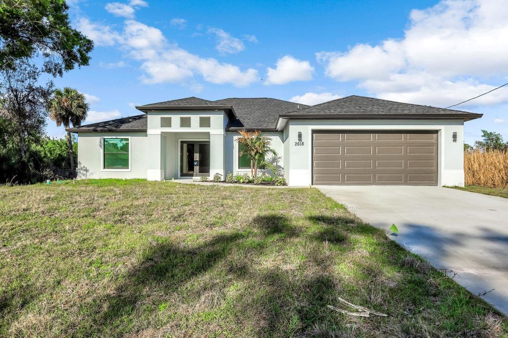 Photo of 2618 Queen Drive, Lehigh Acres, FL 33971 (MLS # F10556272)