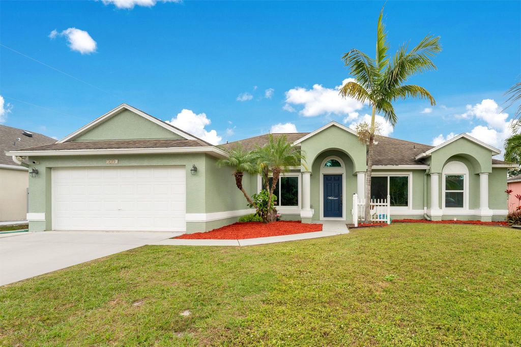 Photo of 1231 SE Naples Lane, Port Saint Lucie, FL 34983 (MLS # R11052379)