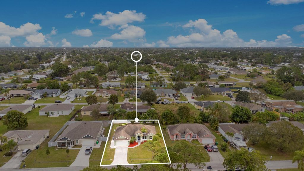 Photo of 1231 SE Naples Lane, Port Saint Lucie, FL 34983 (MLS # R11052379)