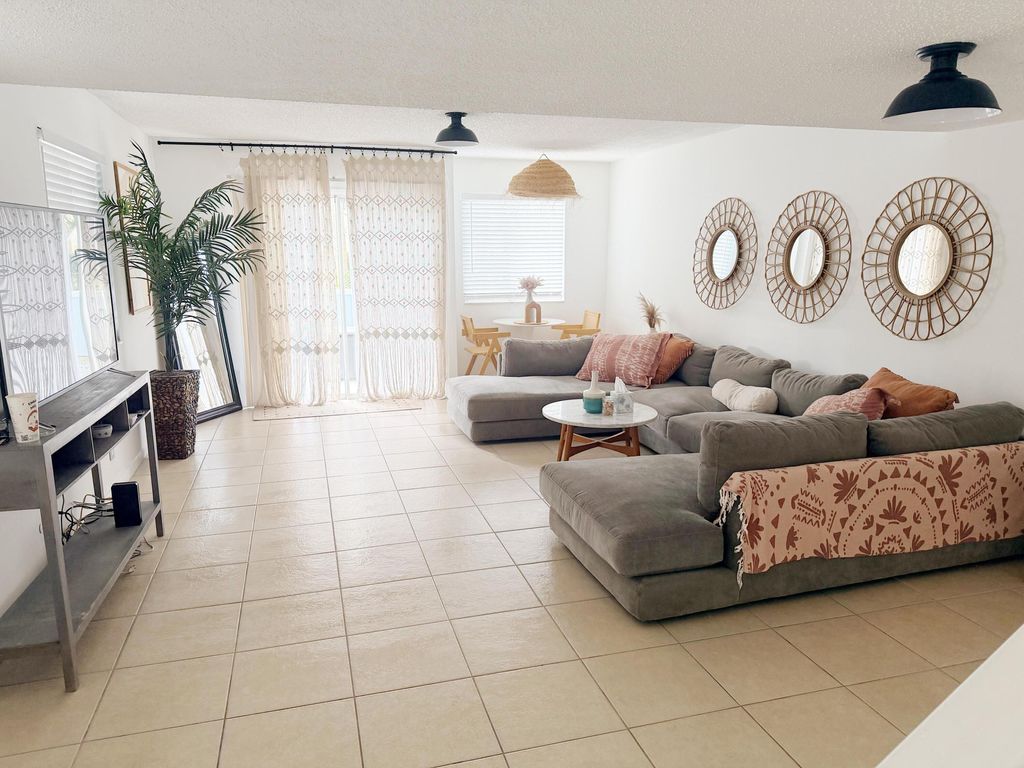 Photo of 6367 Riverwalk Lane #6, Jupiter, FL 33458 (MLS # B26020013)