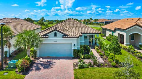 Photo of 12828 SW Ambra Street, Port Saint Lucie, FL 34987 (MLS # B26044779)