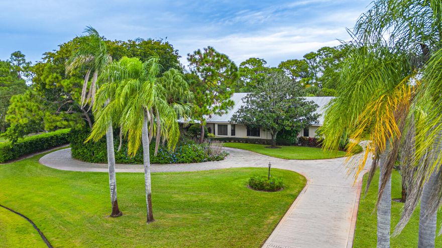 Absolutely stunning custom ranch home, situated on over one magnificently landscaped acre in the most desirable location of Crane Creek Country Club. This home has been meticulously maintained, boasting impact windows plus accordion shutters on the rear sliders.  Fabulous for entertaining family and guests, The gourmet kitchen is what chefs only dream about...leading to the great room as well as formal and casual dining areas.  VillageClubPreserve is the social club for the community, featuring 2 pools, tennis, pickleball and special neighborhood events.  If it's golf you desire, there are 2 golf courses, one is the Banyan Creek Golf Club,  the other is  Martin Downs Golf Club. Measurement, square footage, lot sizes, calculations are deemed reliable but are not guaranteed.   All such information should be independently verified.   


Crane Creek is a recorded planned unit development (PUD) . Crane Creek is divided into 2 sections: The Country Club section (205 homes) is centered around one of the former golf courses of the Martin Downs Country Club, which was called the Crane Creek Golf Course,  The Racquet Club section includes 140 homes.