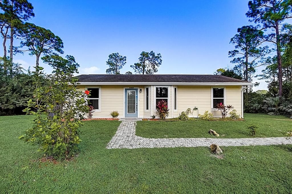 Photo of 15857 Tangerine Boulevard Blvd, The Acreage, FL 33470 (MLS # R10761055)