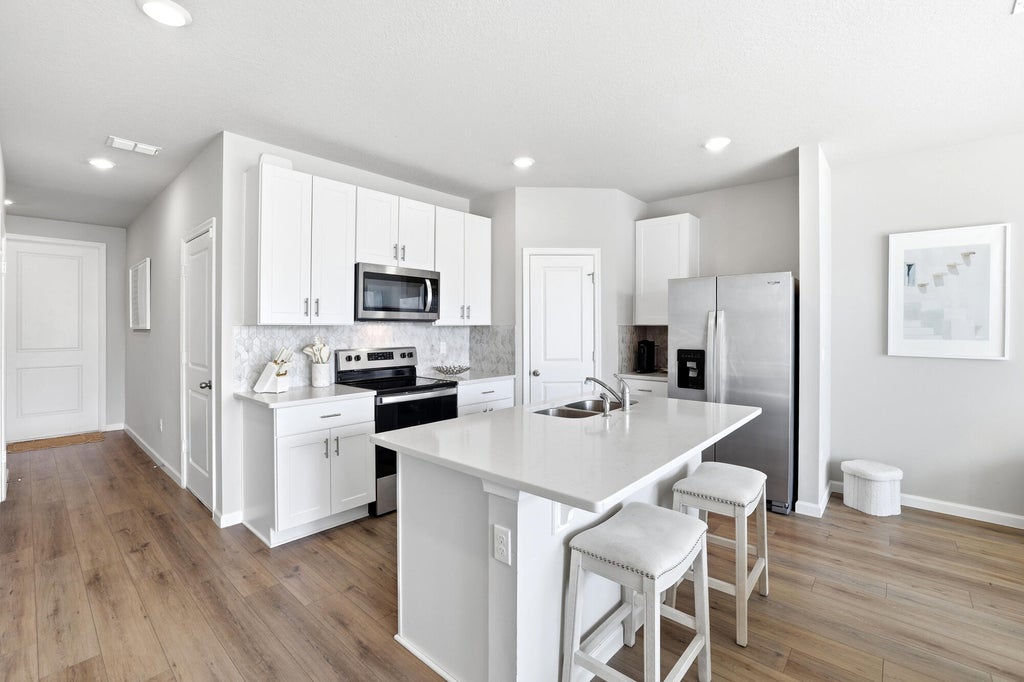 Photo of 5650 Enclave Drive, Mangonia Park, FL 33407 (MLS # B26052942)