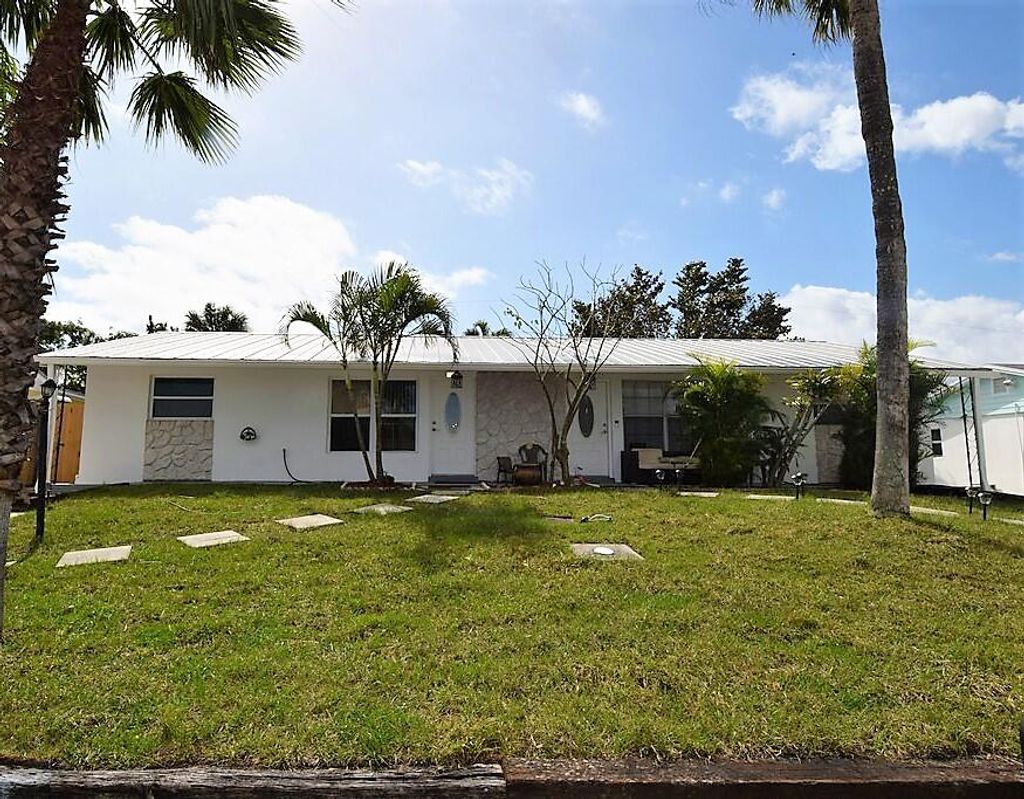 Photo of 2266 NE Rustic Place, Jensen Beach, FL 34957 (MLS # R10866245)