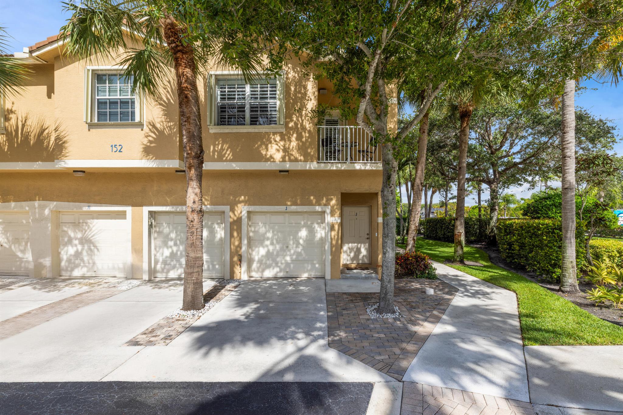 Welcome to 152 Village Boulevard, Unit J -- a beautifully maintained 2-bedroom, 2-bathroom unit located in the highly sought-after community of Tequesta Cay. This bright and spacious residence offers a perfect blend of comfort and style, featuring an open-concept living and dining area, a well-appointed kitchen with ample cabinetry, and a private balcony ideal for enjoying Florida's beautiful weather.Residents of this welcoming community enjoy access to a community pool, perfect for relaxing or soaking up the Florida sun.Situated in a quiet neighborhood, you're just minutes from charming local shops, dining, golf courses, and pristine beaches. This move-in ready gem is ideal as a primary residence or seasonal getaway.Don't miss the chance to own a piece of paradise in Tequesta!