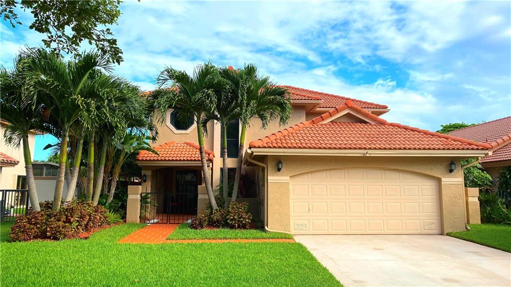 Photo of 3947 NW 6th St, Deerfield Beach, FL 33442 (MLS # F10304229)