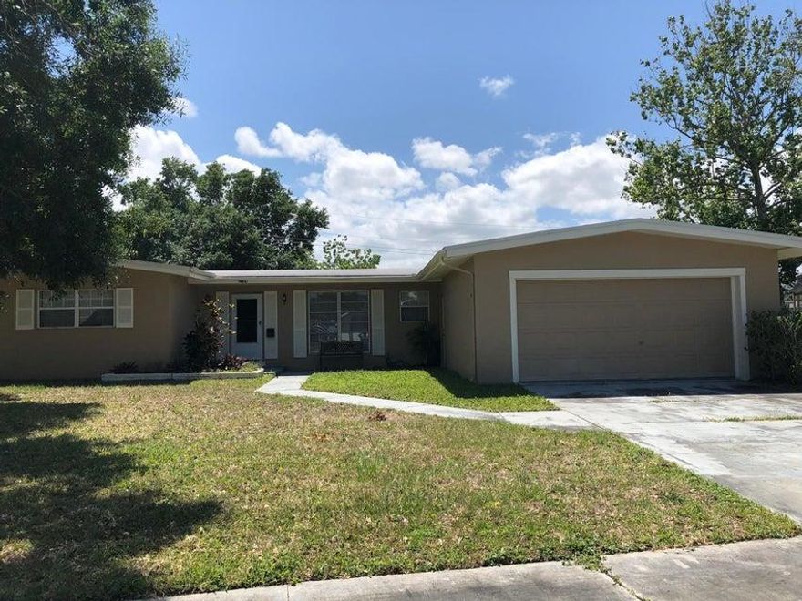 Handyman / Investor special priced to sell FAST!!!  This 3 bedroom, 2 bath, 2 car garage CBS home in Port Malabar just needs some TLC and updating.  Cash or conventional only.