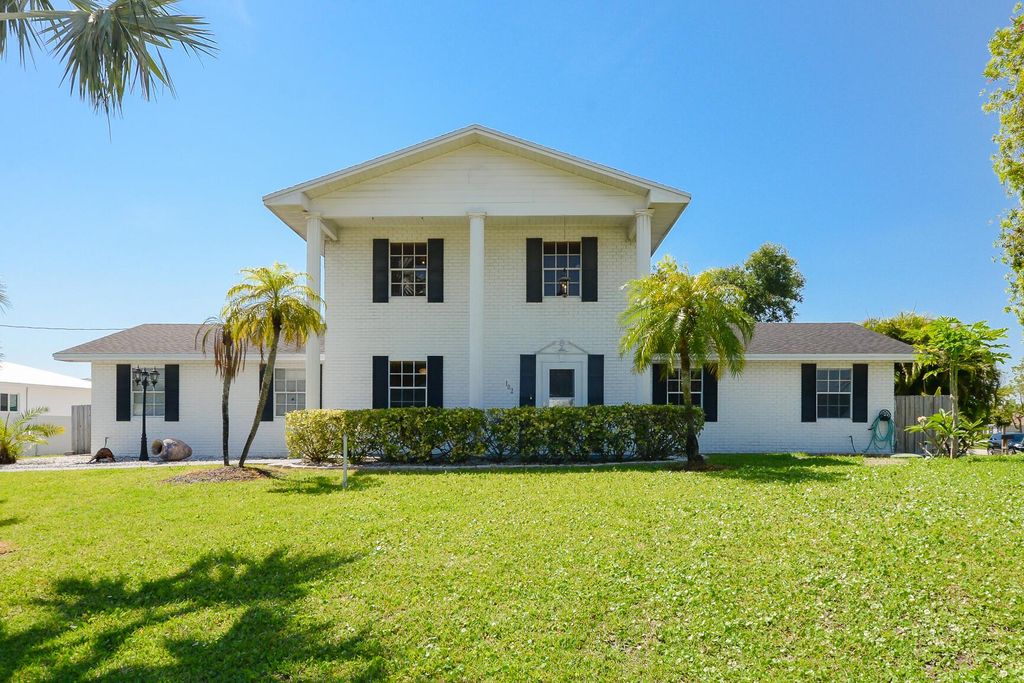Photo of 102 NE Surfside Avenue, Port Saint Lucie, FL 34983 (MLS # R11092451)