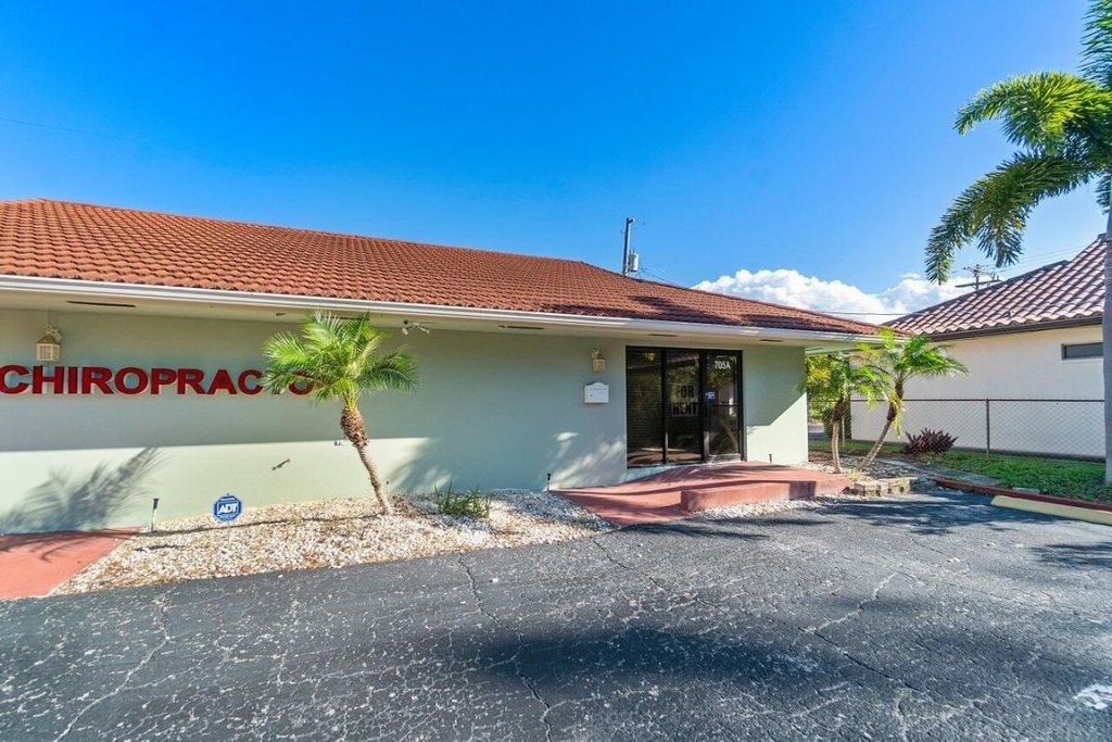 Photo of 705 Park Avenue #A, Lake Park, FL (MLS # R11146686)