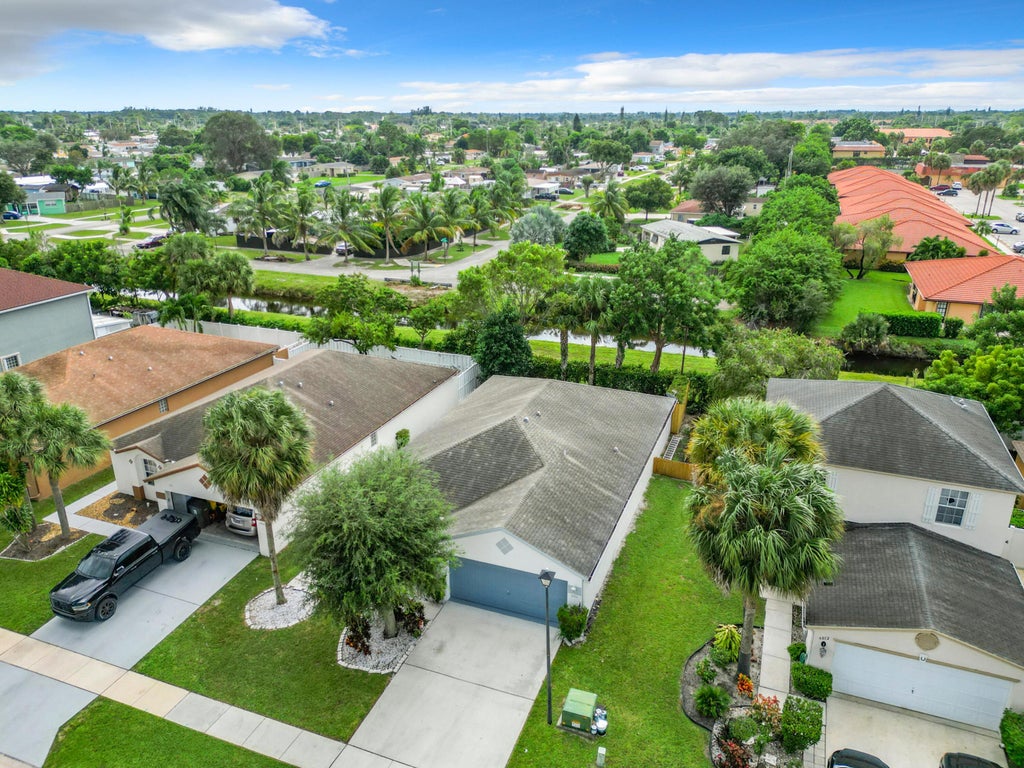 Photo of 6004 Azalea Circle, West Palm Beach, FL 33415 (MLS # R10973248)