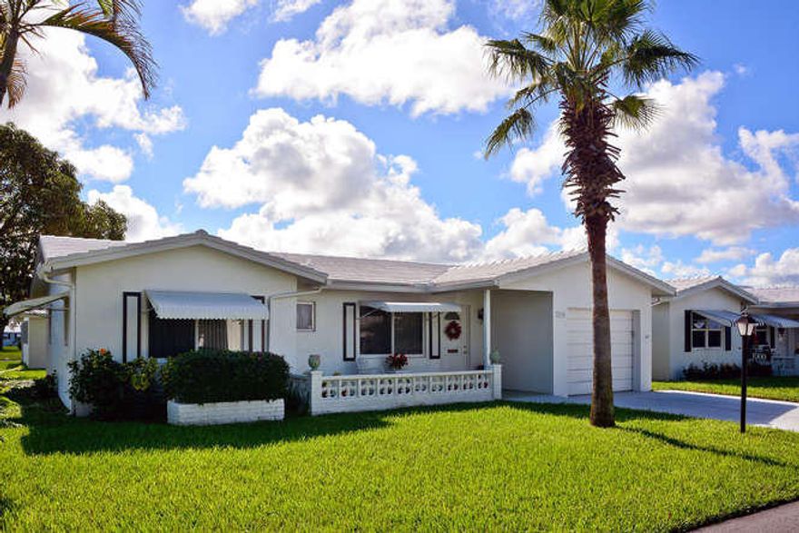 ENJOY A GREAT FLORIDA LIFESTYLE IN THIS WONDERFUL 55 AND OLDER COMMUNITY!  ADORABLE  2 BEDROOM, 2 BATHROOM HOME ON A CORNER LOT AND STEPS TO THE CLUBHOUSE WITH IT'S SWIMMING POOL AND WORLD CLASS ACTIVITIES! THIS HOME FEATURES AN EAT IN KITCHEN WITH GRANITE COUNTER TOPS, A GENEROUS MASTER BEDROOM WITH ENSUITE BATH AND OVERSIZE WALK IN CLOSET. VERSATILE 2ND BEDROOM WITH A WALK IN CLOSET. SUNNY LIVING AND DINING ROOM AND ALL SEASONS PORCH. MOST WINDOWS WERE REPLACED IN 2005. THIS HOME OFFERS A ONE CAR GARAGE AND IS CLOSE TO AREA BEACHES, GOLF COURSES, RESTAURANTS, SHOPPING AND DOWNTOWN DELRAY BEACH!