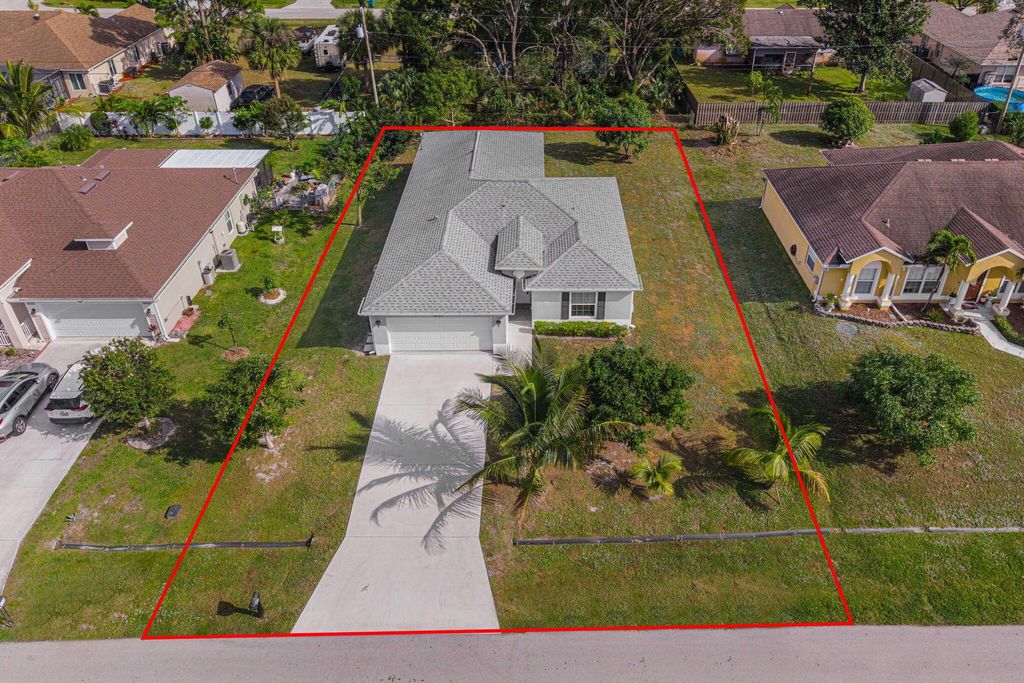 Photo of 4137 SW Daniff Street, Port Saint Lucie, FL 34953 (MLS # R11044128)