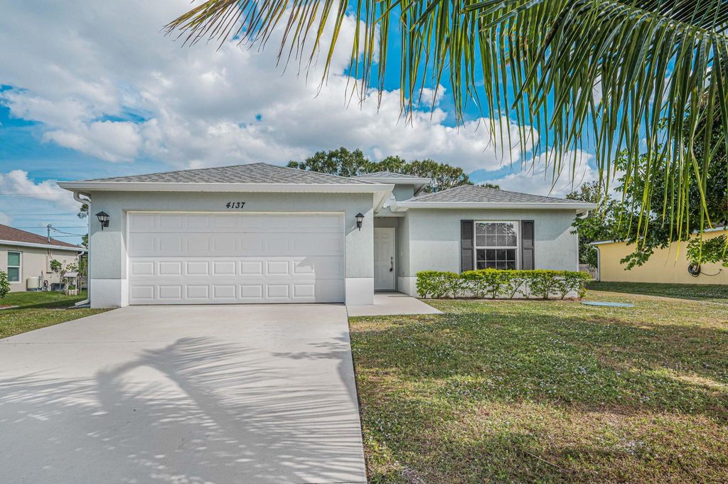 Photo of 4137 SW Daniff Street, Port Saint Lucie, FL 34953 (MLS # R11044128)