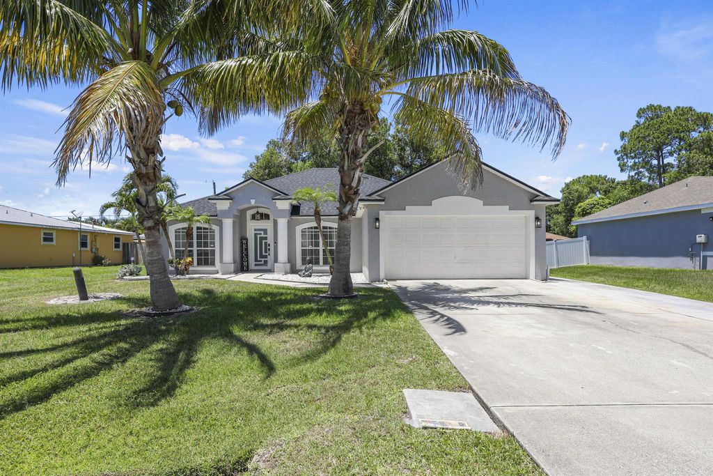 Photo of 421 NW Cornell Avenue, Port Saint Lucie, FL 34983 (MLS # R11101101)