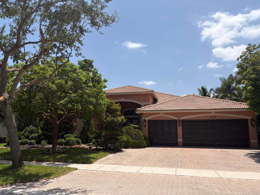Photo of 4916 FOREST DALE Drive, Lake Worth, FL 33449 (MLS # B26065693)