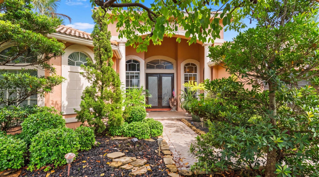 Photo of 4916 FOREST DALE Drive, Lake Worth, FL 33449 (MLS # B26065693)
