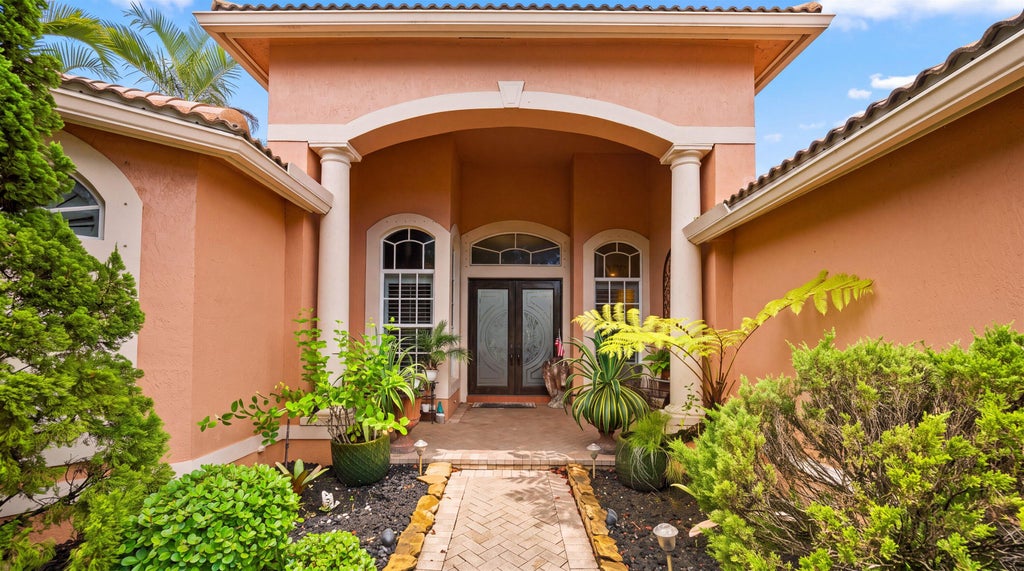 Photo of 4916 FOREST DALE Drive, Lake Worth, FL 33449 (MLS # B26065693)