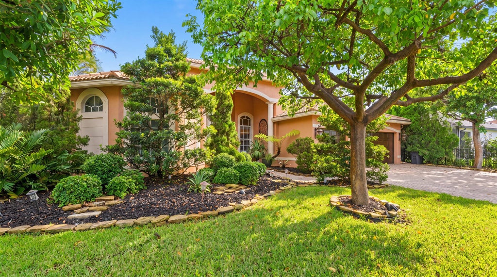 Photo of 4916 FOREST DALE Drive, Lake Worth, FL 33449 (MLS # B26065693)