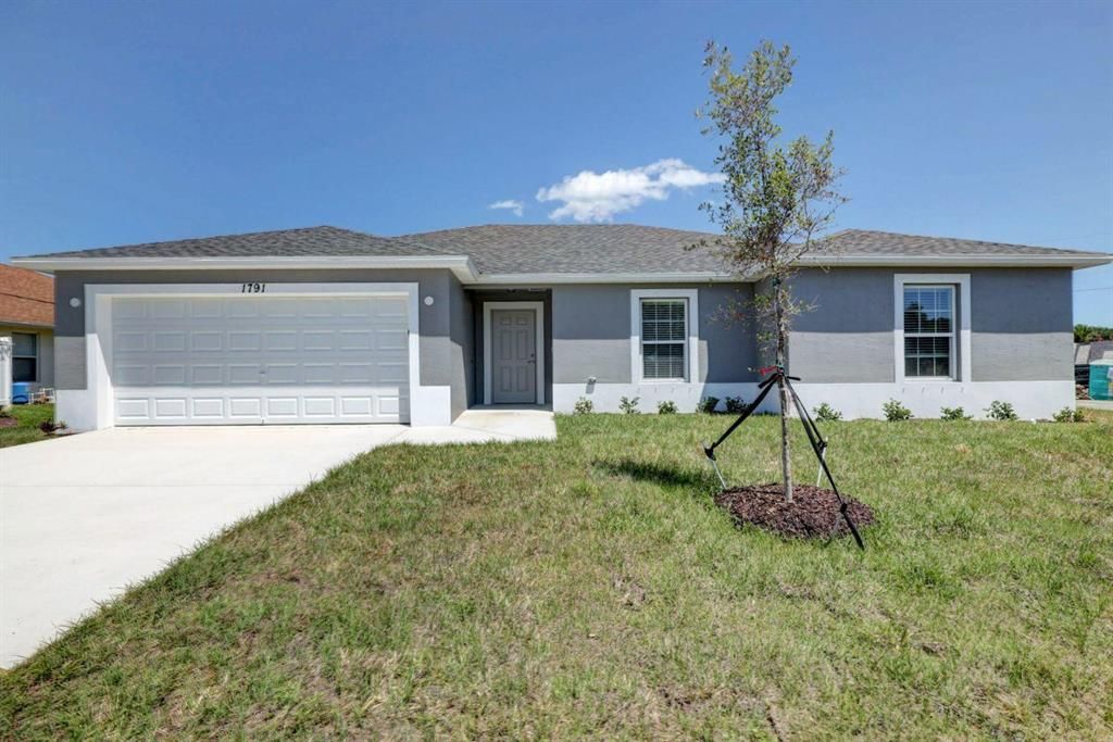Photo of 799 SW Sardinia Avenue, Port Saint Lucie, FL 34953 (MLS # R10773711)