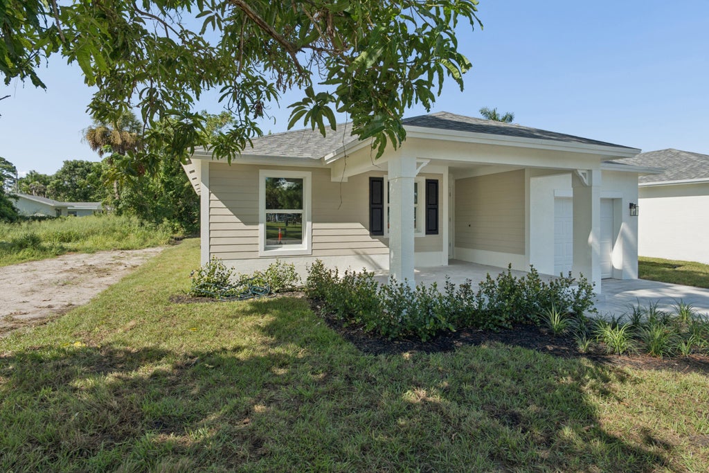 Photo of 5664 SE 45th Avenue, Stuart, FL 34997 (MLS # B26090219)