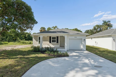 Photo of 5664 SE 45th Avenue, Stuart, FL 34997 (MLS # B26090219)