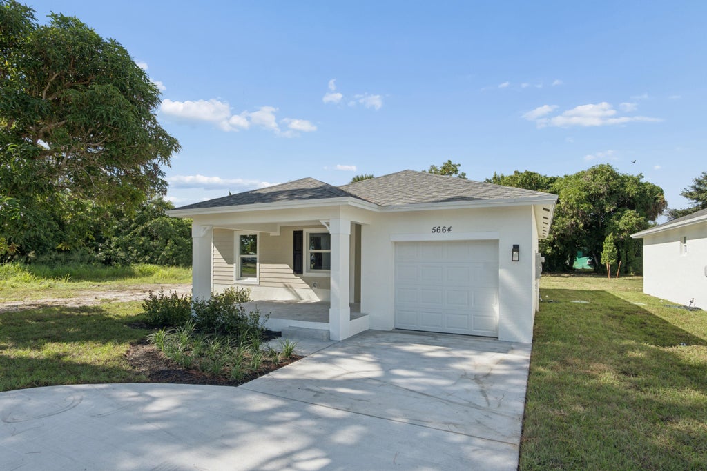 Photo of 5664 SE 45th Avenue, Stuart, FL 34997 (MLS # B26090219)