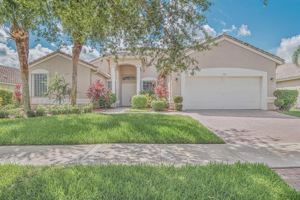 Photo of 521 NW Blue Lake Drive, Port Saint Lucie, FL 34986 (MLS # R10736976)