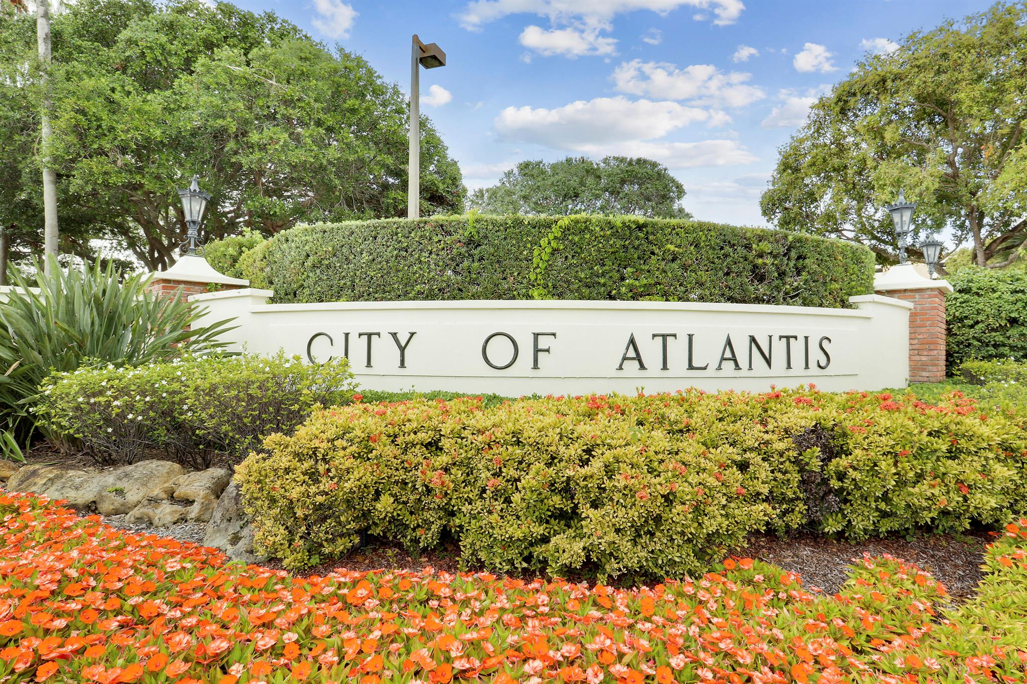This charming single-family residence boasting 2 bedrooms and 2 bathrooms, situated on an expansive lot. Nestled within a quaint Atlantis boutique subdivision of fewer than 25 homes, this property showcases partial impact glass windows and a brand-new roof from 2021. This home has been meticulously remodeled with kitchen open to living. Atlantis is a non-equity Golf Community with a manned gate. Enjoy the convenience of a central location, with proximity to restaurants, shopping, airports, and major highways. Schedule your private showing today.