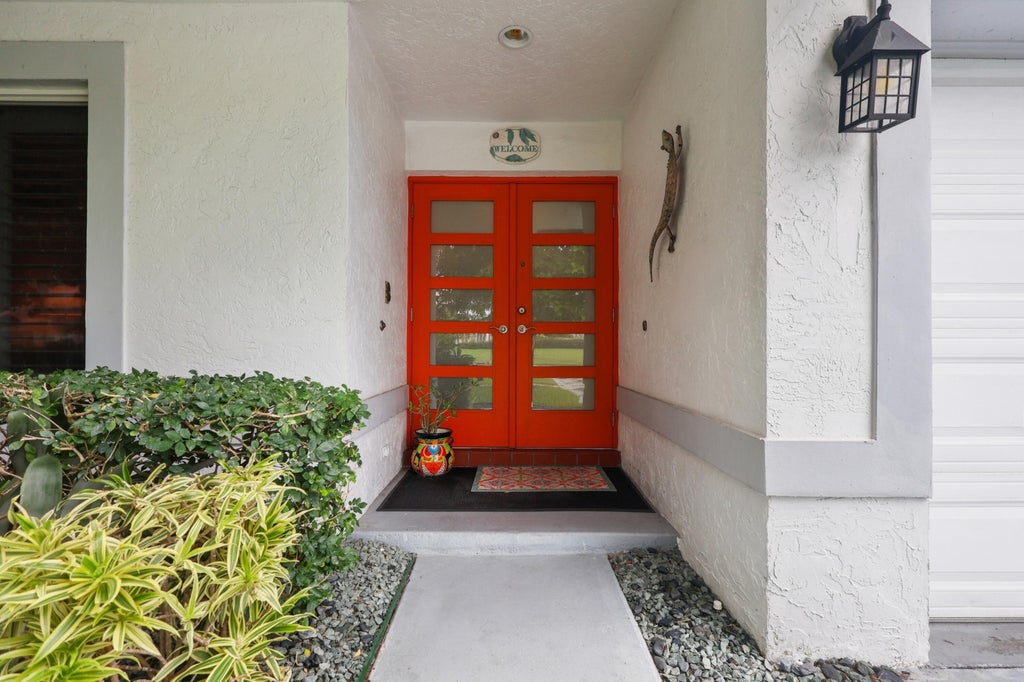 Photo of 396 REDWOOD Lane, Boca Raton, FL 33487 (MLS # B26077442)