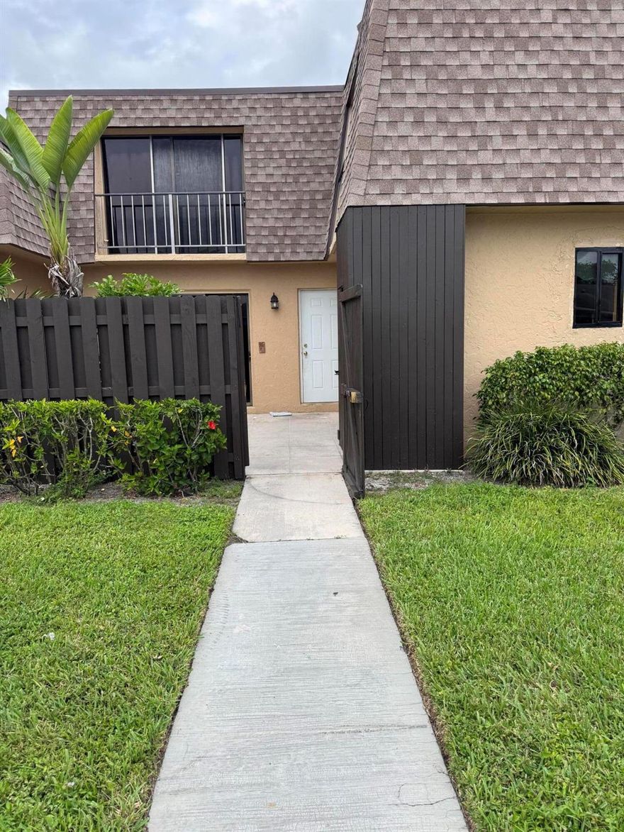 Spacious 3 Bed 2.5 Bath Townhome! Large fenced in patio!  Needs cosmetic repairs and new appliances space for washer and dryer.