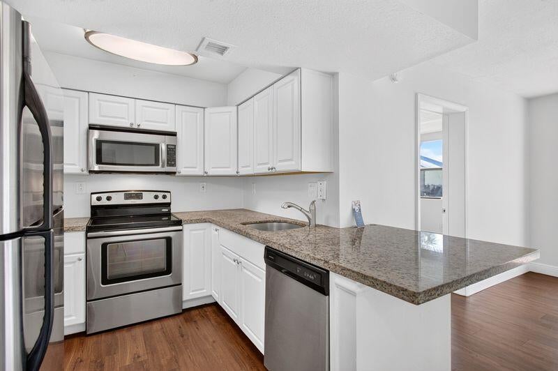 Photo of 706 Executive Center Drive #23, West Palm Beach, FL 33401 (MLS # B26052701)