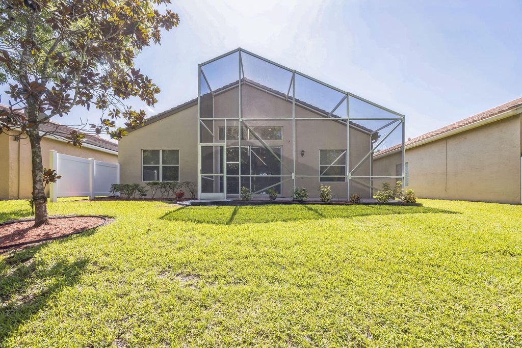 Photo of 5780 Saddle Trail Lane, Lake Worth, FL 33449 (MLS # B26037391)