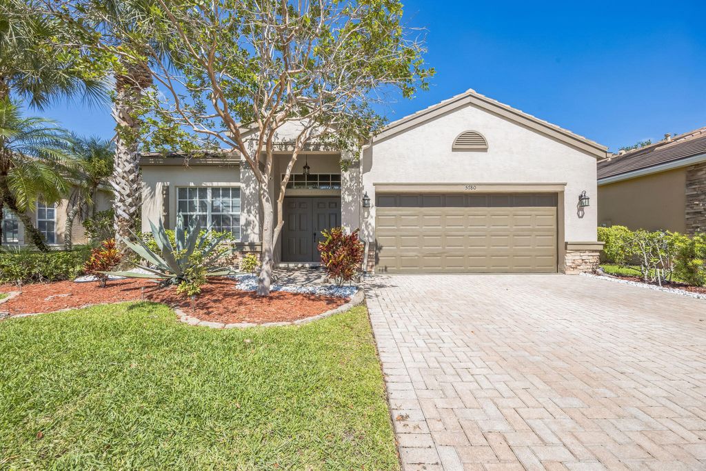 Photo of 5780 Saddle Trail Lane, Lake Worth, FL 33449 (MLS # B26037391)