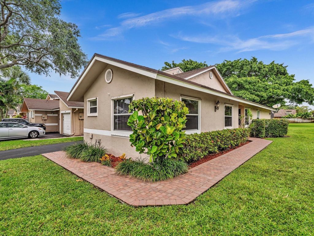 Photo of 1251 NW 52nd Way, Deerfield Beach, FL 33442 (MLS # F10513645)