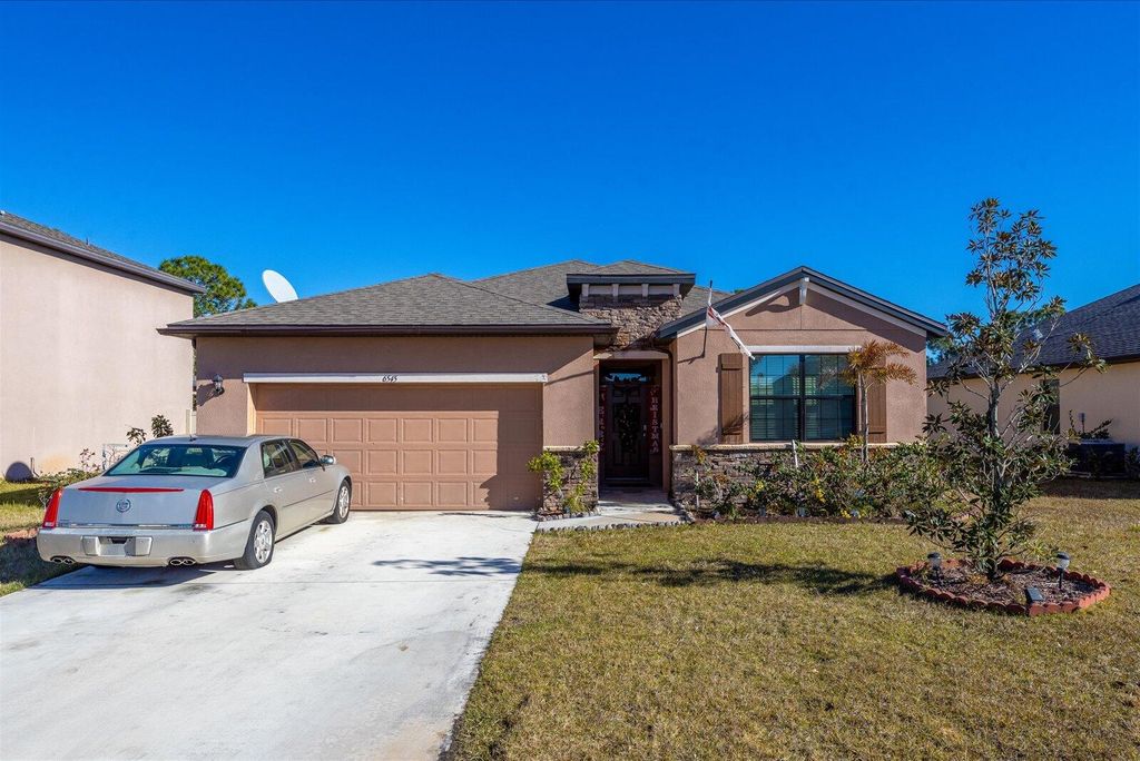 Photo of 6545 NW Oaklawn Way, Port Saint Lucie, FL 34983 (MLS # R11162539)